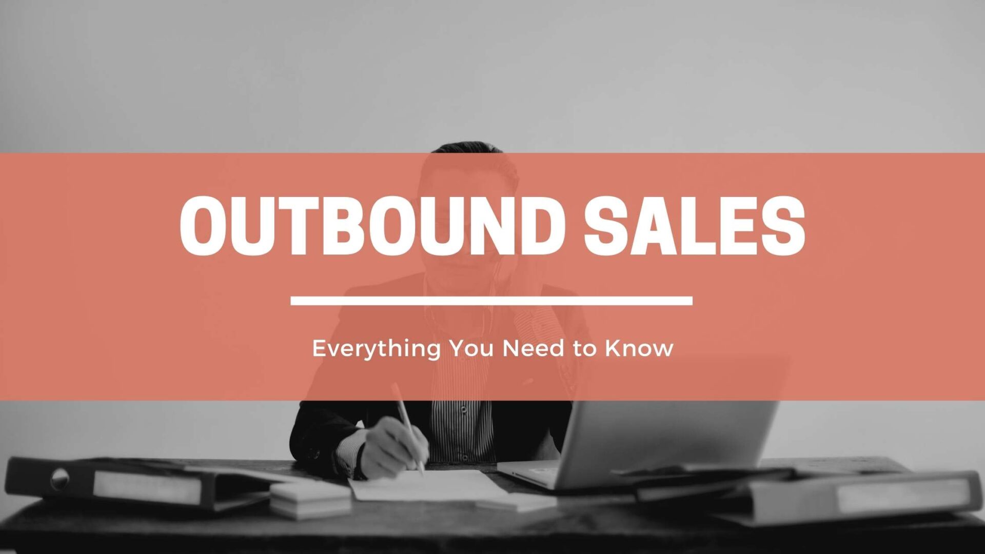 Outbound salesperson on laptop behind title text.